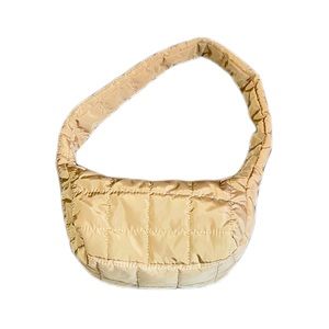 Small beige puffer purse